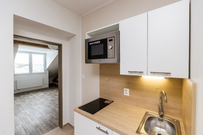 Součástí vybavení jsou kuchyňky, v objektu bude i prádelna.