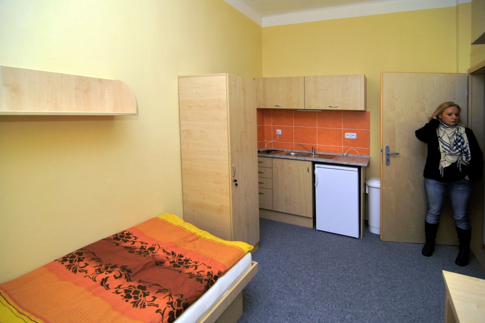 V pokoji nechybí ani kuchyňský kout