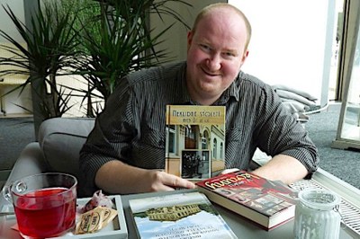 Kamil Rodan s některými ze svých knih. Foto: Petr Broulík, Magazín Patriot