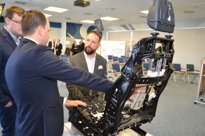 Ostrava’s Mayor Tomáš Macura (right) at a Brose car seat production line. Photograph: René Stejskal 