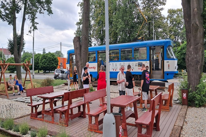 Fajna Zastávka - old tram, café and community space in front of local church. Photo: Café Tramvaj